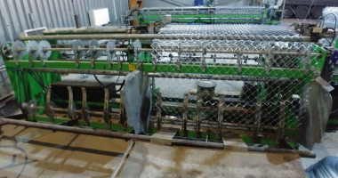 MACHINE FOR PRODUCTION OF CHAIN LINK FENCE